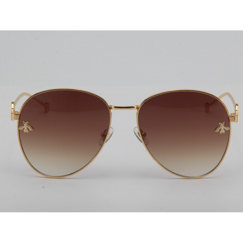 Gucci GG0398S Sunglasses In Gradient Grey Gold