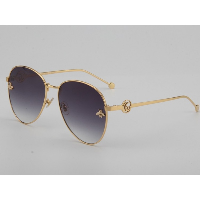 Gucci GG0398S Sunglasses In Grey Gold