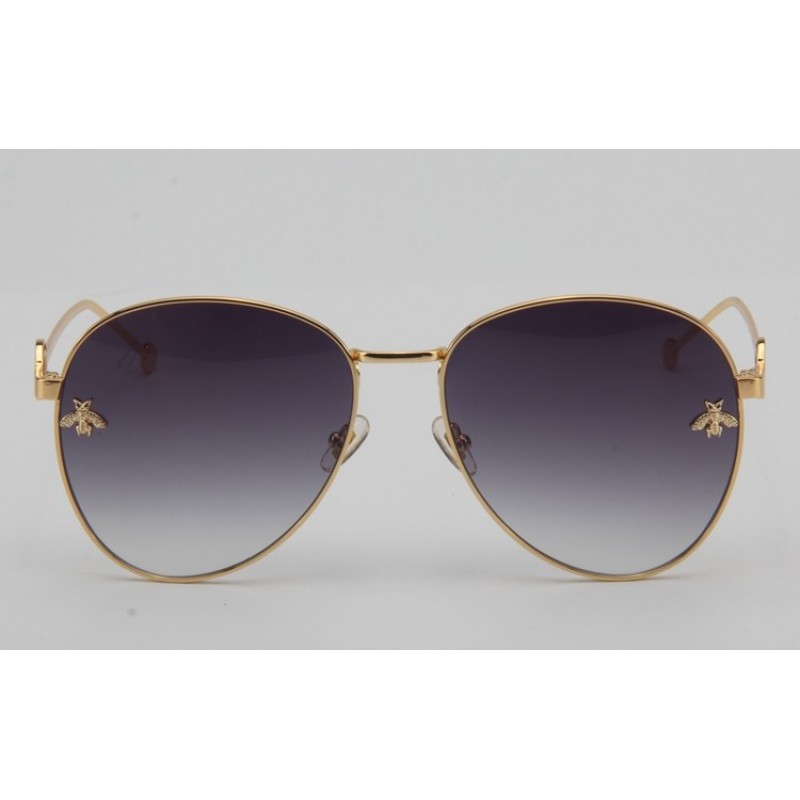 Gucci GG0398S Sunglasses In Grey Gold