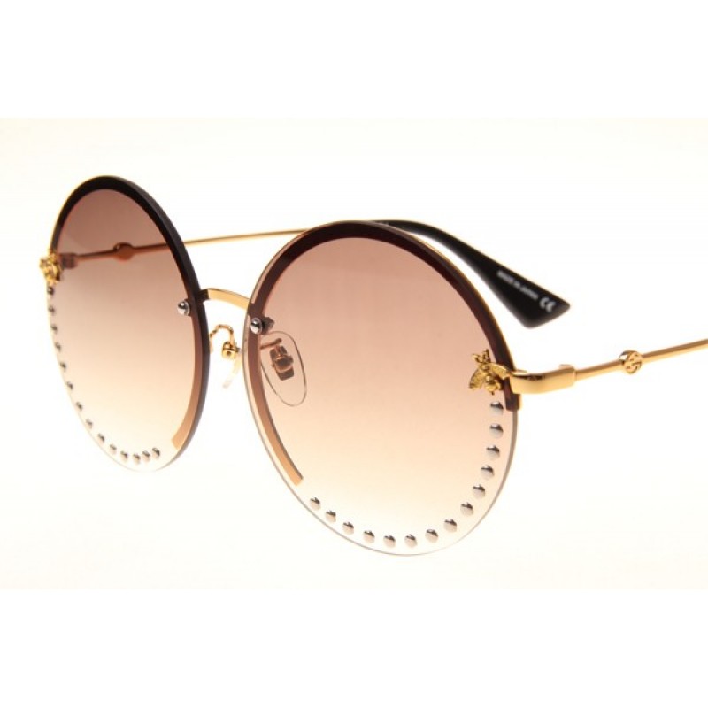 Gucci GG1072S Sunglasses In Gold Gradient Brown