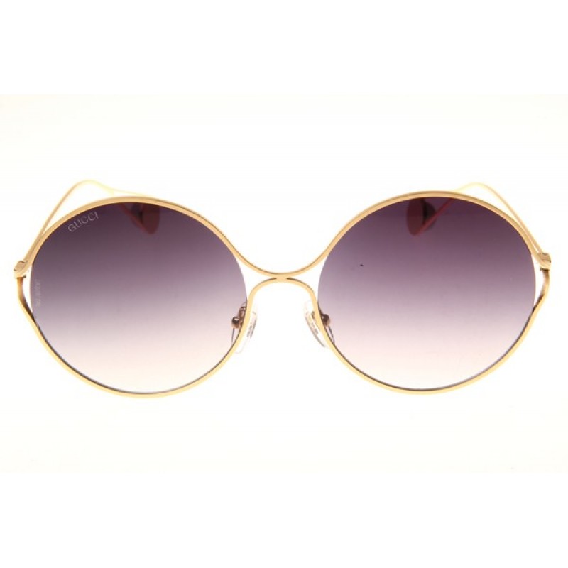 Gucci GG0253S Sunglasses In Gold Gradient Grey