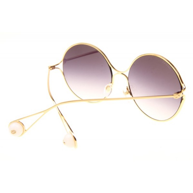 Gucci GG0253S Sunglasses In Gold Gradient Grey