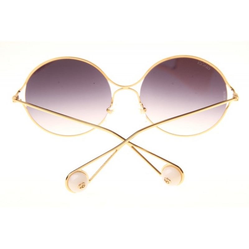 Gucci GG0253S Sunglasses In Gold Gradient Grey