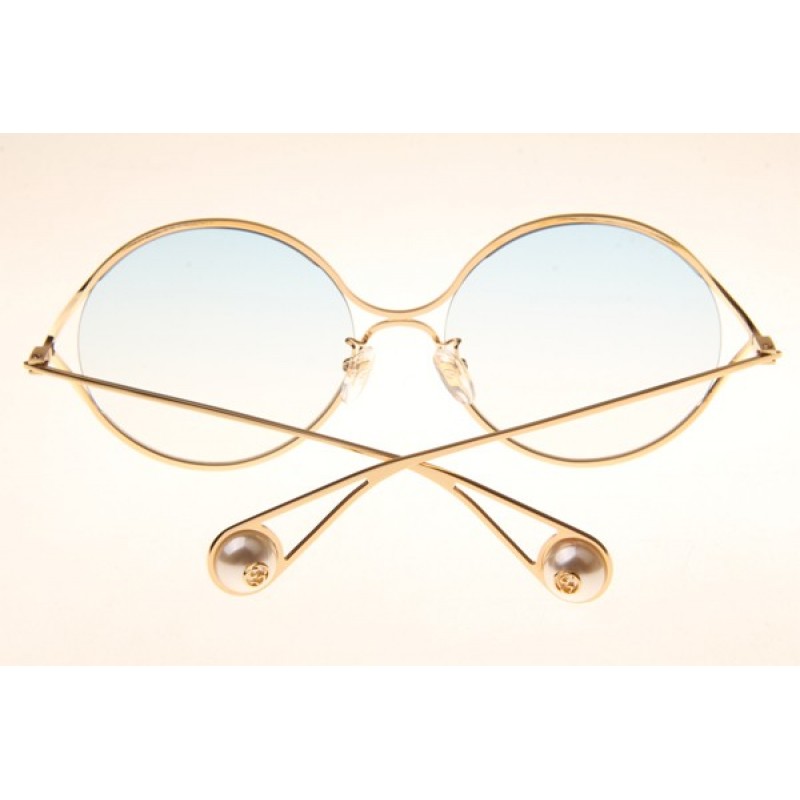 Gucci GG0253S Sunglasses In Gold Gradient Blue