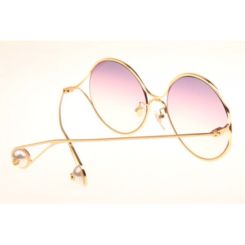 Gucci GG0253S Sunglasses In Gold Gradient Pink