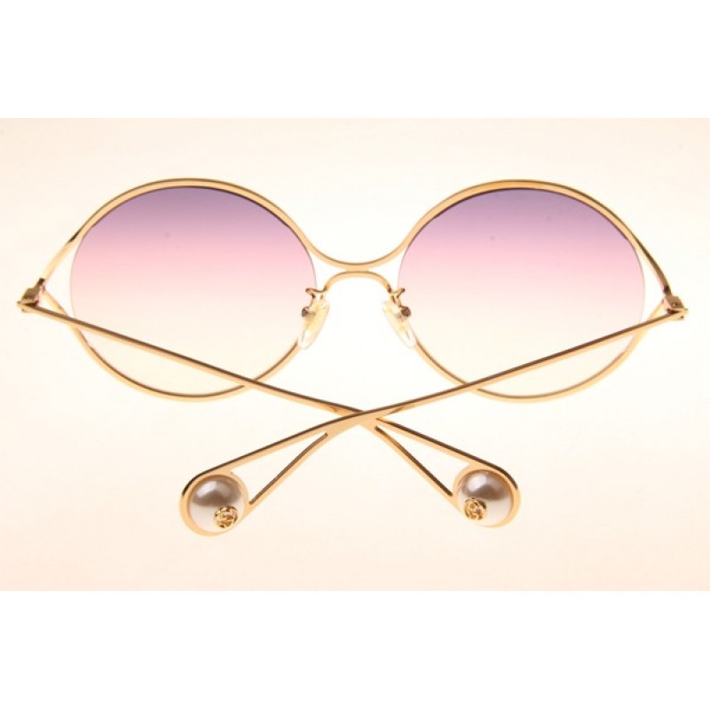 Gucci GG0253S Sunglasses In Gold Gradient Pink