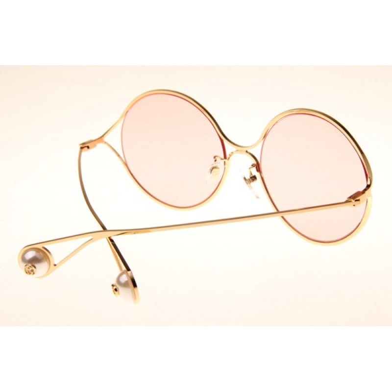 Gucci GG0253S Sunglasses In Gold Pink