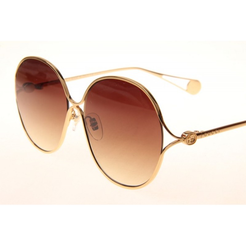 Gucci GG0255S Sunglasses In Gold Gradient Brown
