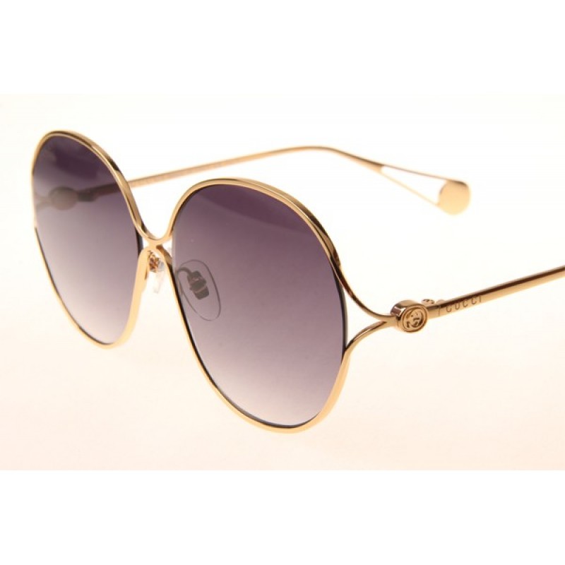 Gucci GG0255S Sunglasses In Gold Gradient Grey