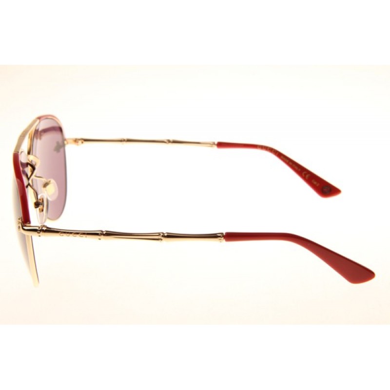 Gucci GG0338S Sunglasses In Red Gold