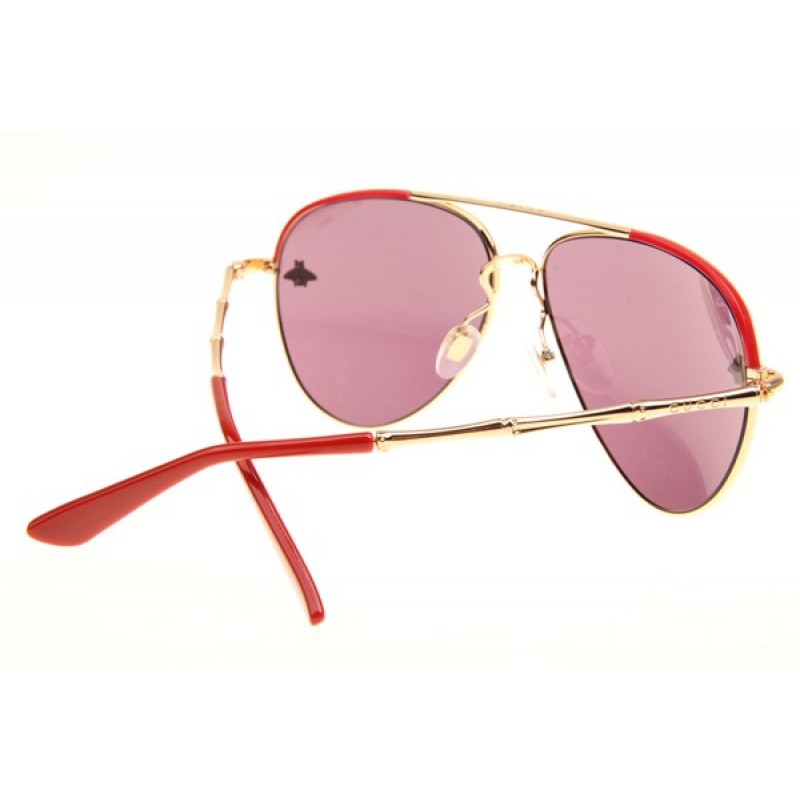 Gucci GG0338S Sunglasses In Red Gold