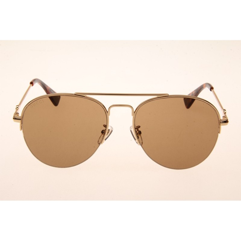 Gucci GG0107S Sunglasses In Gold Brown Lens