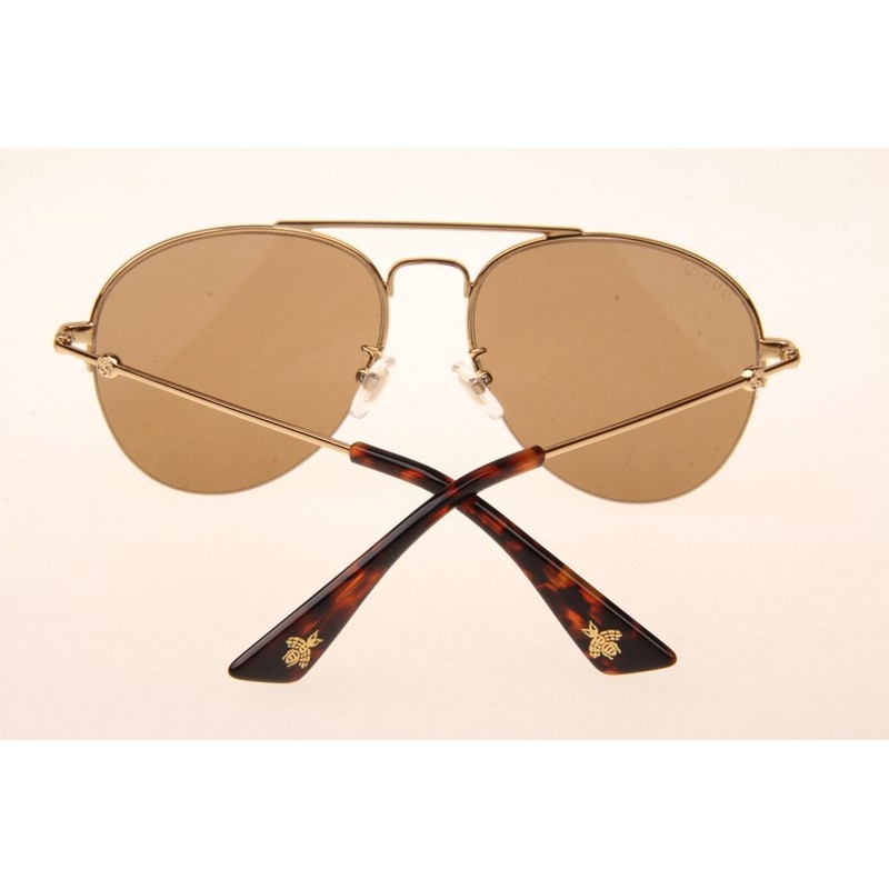 Gucci GG0107S Sunglasses In Gold Brown Lens