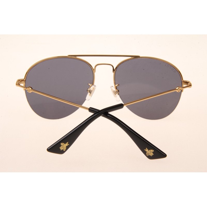 Gucci GG0107S Sunglasses In Gold Grey Lens