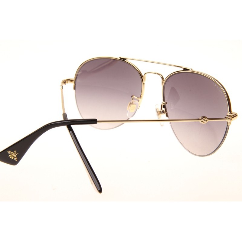 Gucci GG0107S Sunglasses In Gold Gradient Grey