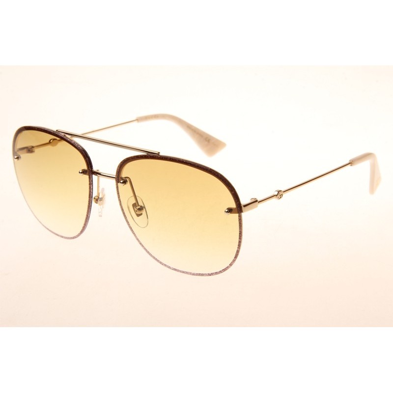 Gucci GG0227S Sunglasses In Gold White
