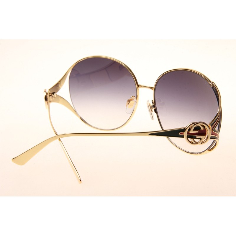 Gucci GG0225S Sunglasses In Gold Gradient Grey